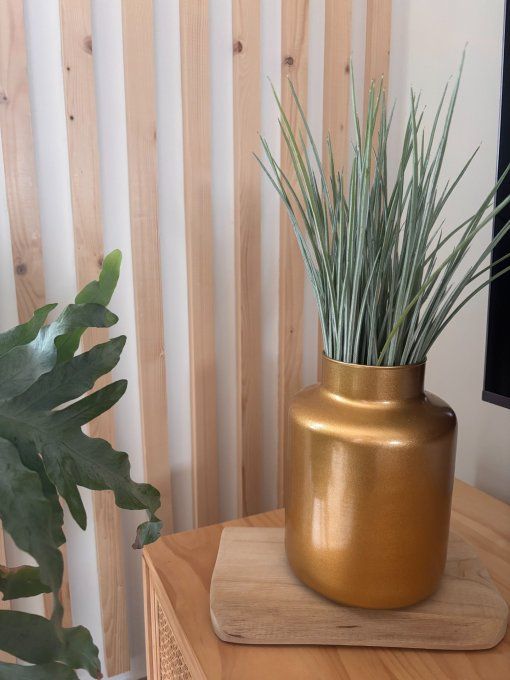 Vase en verre doré